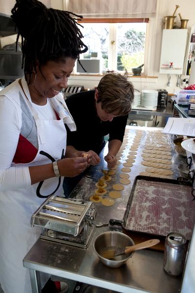 Jax with Manager Heidi Barlow preparing dinner in the Pen-y-bryn kitchen